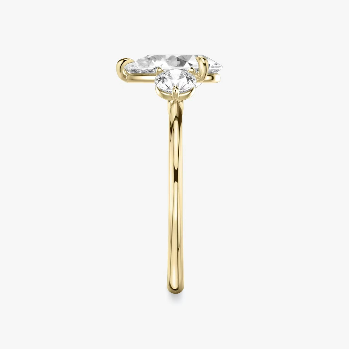 The Three Stone | Pear | 18k | 18k Yellow Gold | Band: Plain | Side stone carat: 1/4 | Side stone shape: Round Brilliant | Diamond orientation: vertical | Carat weight: See full inventory